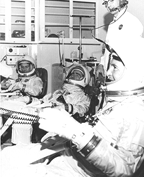 3 astronauts in spacesuits on alert