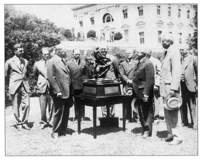 President Herbert Hoover awarding Collier to Dr. Joseph S. Ames.