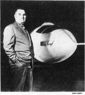 Picture of Lawrence D. Bell standing in front of the X-1 rocketplane.