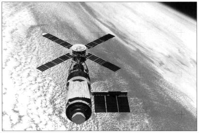 Photo of Skylab over clouds and open ocean.