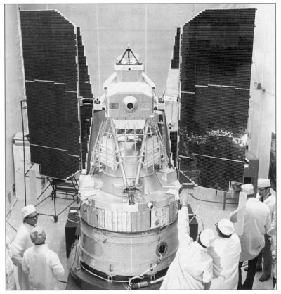 Photo of the Landsat in a General Electric clean room being tested.