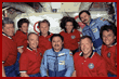 Crewmembers pose for photos in the Mir Base Block