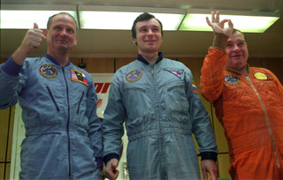Mir-18 crew portrait: Norm Thagard, Vladimir Dezhurov, and Gennady Strekalov