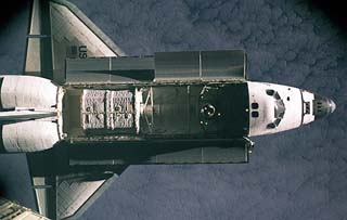 View of the approach of the STS-79 orbiter Atlantis during its docking with the Mir space station.