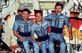 Portrait of the Mir-23 crew in the Base Block, Commander Vasily Tsibliev, guest researcher Jerry Linenger and flight engineer Aleksandr Lazutkin.