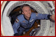  Thomas floats through the DM hatch into the shuttle airlock 
