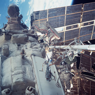Musabayev and Budarin conducting an EVA outside the Mir