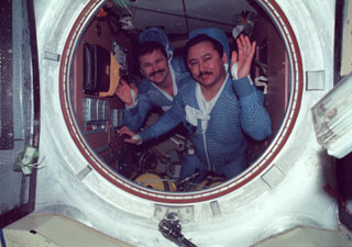 Musabayev and Budarin wave from Kvant-2 hatch prior to EVA