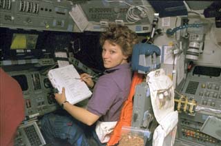 Collins at the pilot's station during "hotfiring" procedure.
