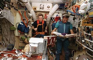 View of astronaut Shannon Lucid exercising on a treadmill