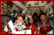  Chocolate candy shuttles fly freely about the Mir during the gift exchange