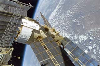 Survey view taken of the Mir space station by the crew of the STS-86 orbiter Atlantis includes Spektr module (no damage visible).