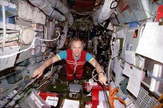 Mir-24 commander Anatoly Solovyev floats through Mir.