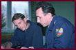 Gagarin Cosmonaut Training Center in Star CityP Linenger sits at a table next to a Russian trainer