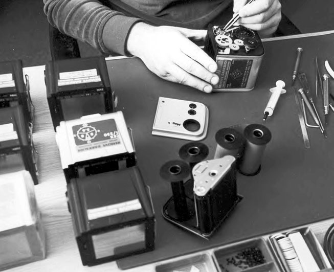 Hasselblad technician with
            Apollo magazines.