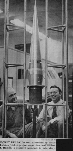Leslie Jones and William Hansem check a rocket