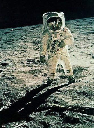 Buzz standing in a small crater