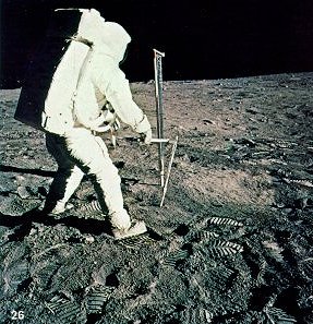 Aldrin driving the core tube into the surface