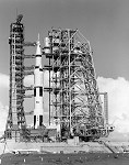 The Mobile Service Structure approaches the Saturn V on pad 39-A