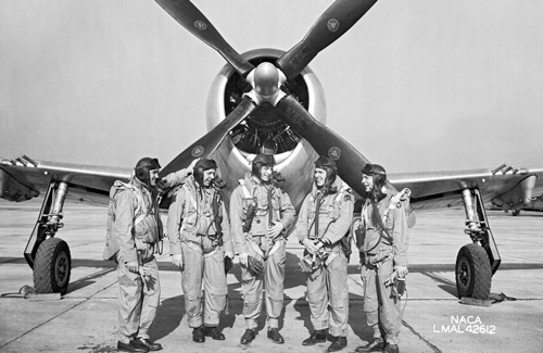 Image of pilots in from of plane