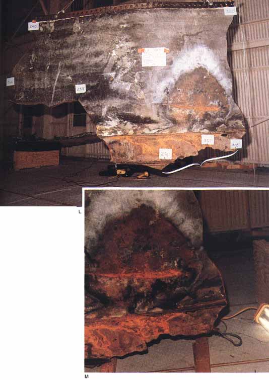Photos L & M [top, bottom]

: Examined at Kennedy Space Center after their recovery from the ocean, these fragments show the extent of burn through the right hand booster's aft field joint. On the left page are sections of the aft center motor above the joint. On the right page are sections (inverted) of the aft motor segment showing burn-hole below the joint (bracket). Except for the interior views on lower left, the camera is viewing the parts from outside the casing.