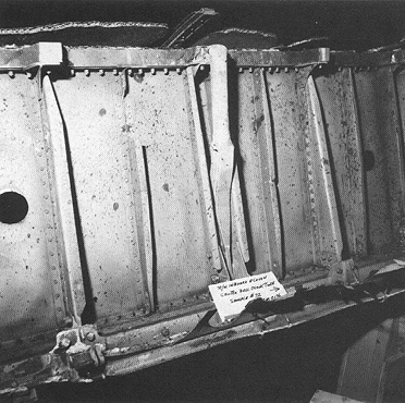 Photograph 9. Titanium Deposits on Forward Closure Panel of the Right Inboard Elevon.