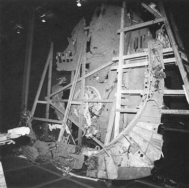 Photograph 11. Aft Pressure Bulkhead of Crew Module, Viewed from Aft Right Side. Fuselage Frame 582 Located Just Aft of Bulkhead.