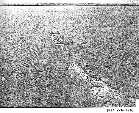 SRB being towed by retrieval ship