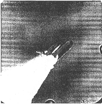 Photo showing deflection of SRB plume.